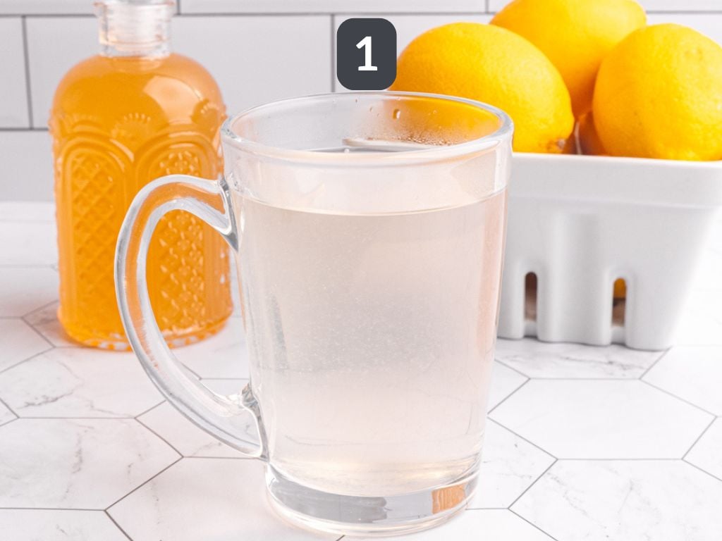 Lemon ginger tea step 1 - mix the syrup and water.