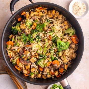A pan of vegan teriyaki noodles, freshly cooked.