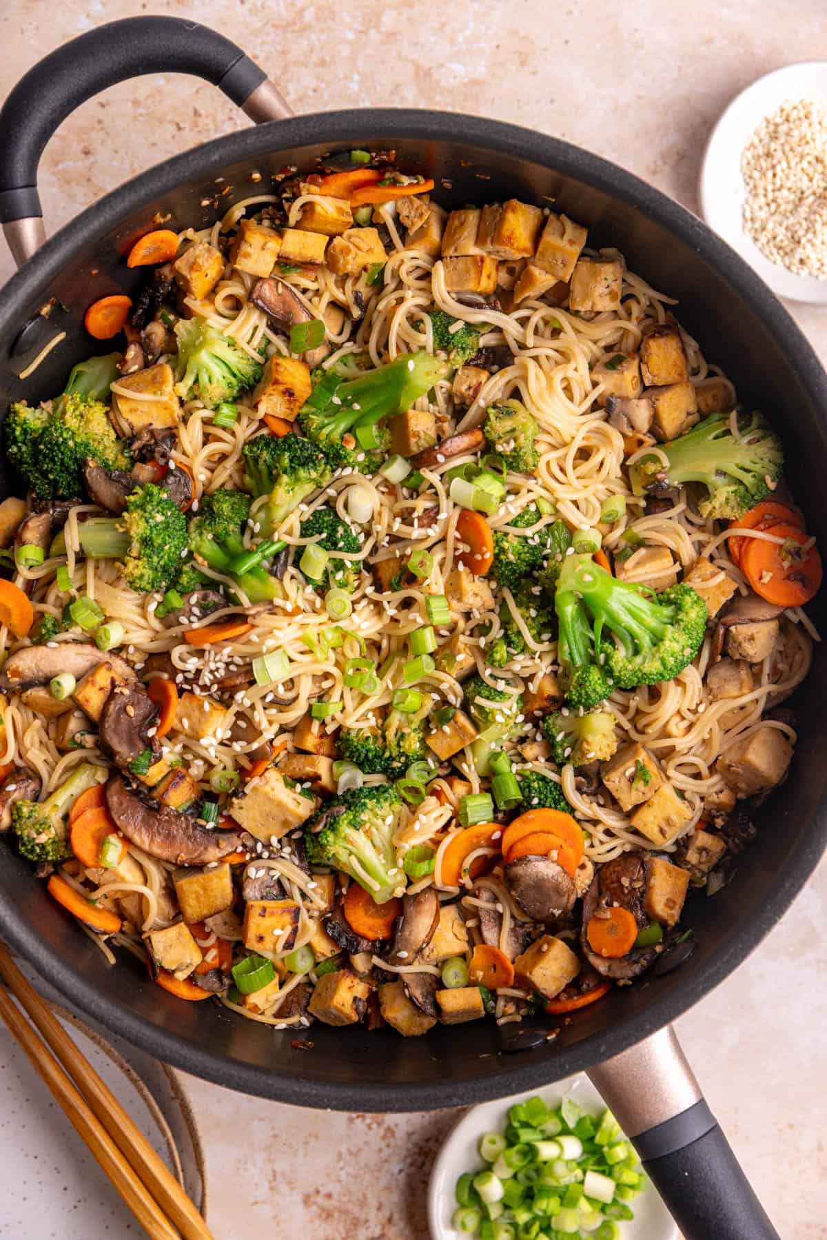A pan of vegan teriyaki noodles, freshly cooked.