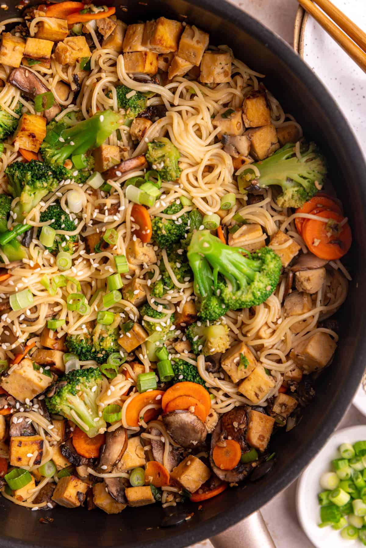 A pan of vegan teriyaki noodles, freshly cooked.