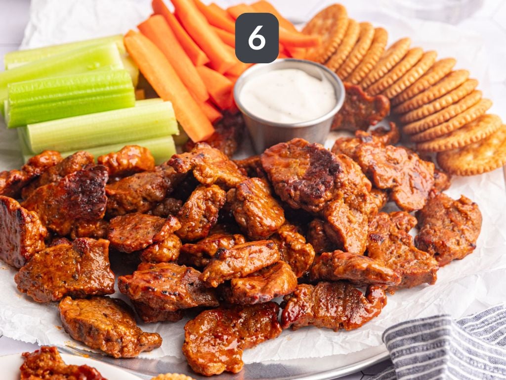 Vegan Buffalo Seitan Wings Step 6 - serve with veggies and ranch.