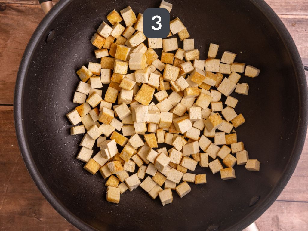 Vegan satay noodles step 3 - pan-cook the tofu.
