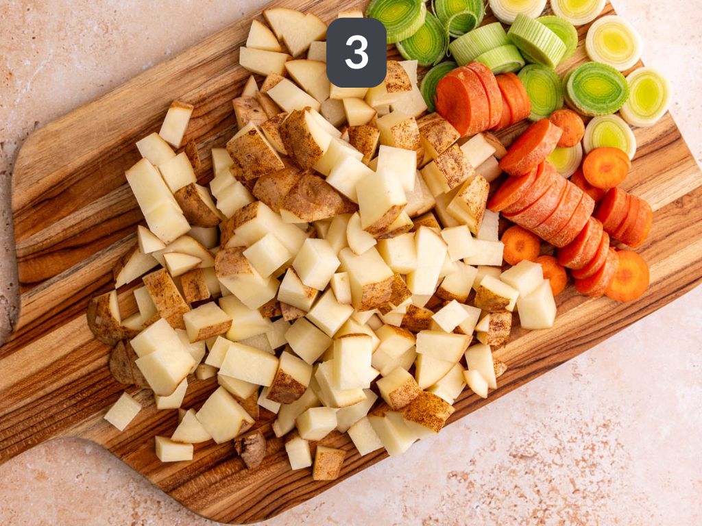 Vegan Potato Leek Soup Step 3 - chop the potatoes and vegetables.
