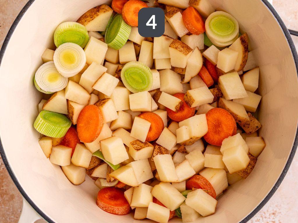 Vegan Potato Leek Soup Step 4 - sauté the potatoes and vegetables.