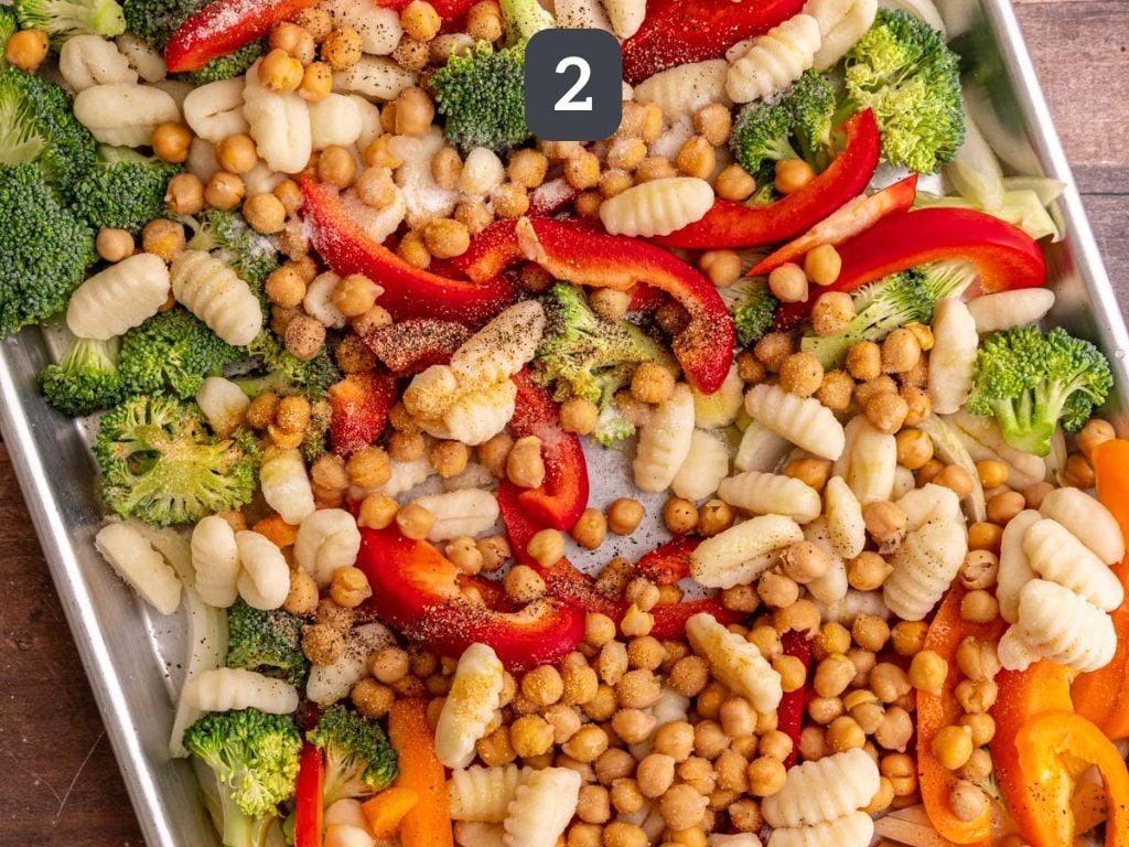 Sheet Pan Gnocchi Step 2 - toss the vegetables with the spices.
