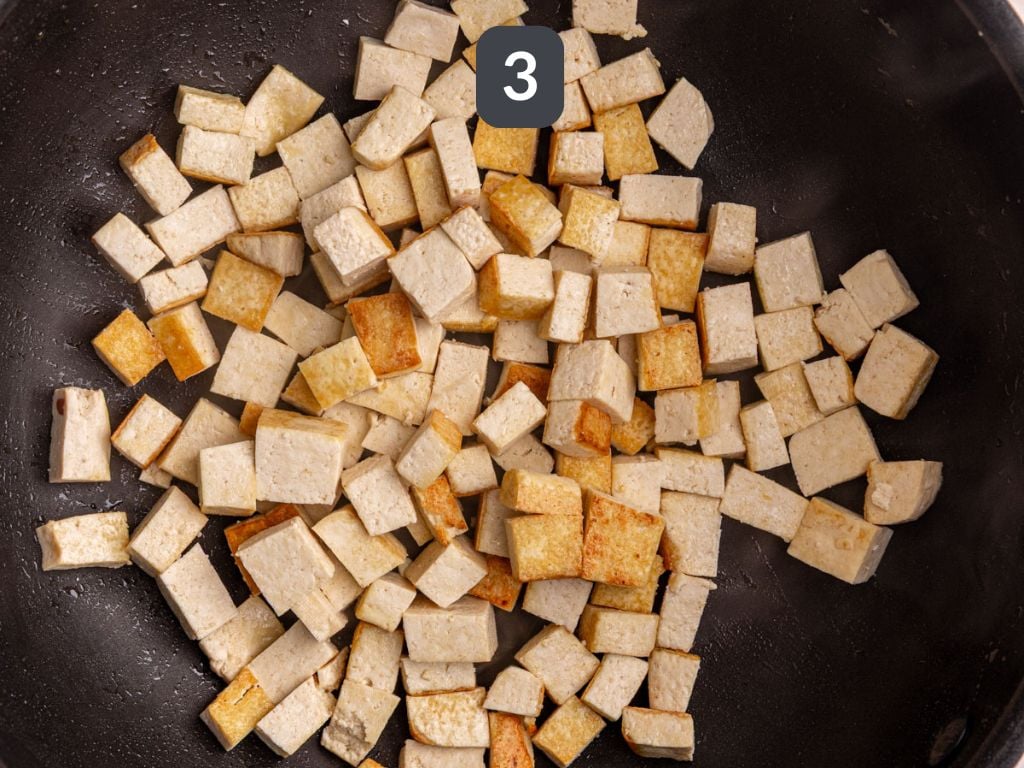 Vegan drunken noodles step 3 - sauté the tofu.