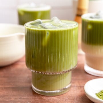 A glass of vegan iced matcha latte.