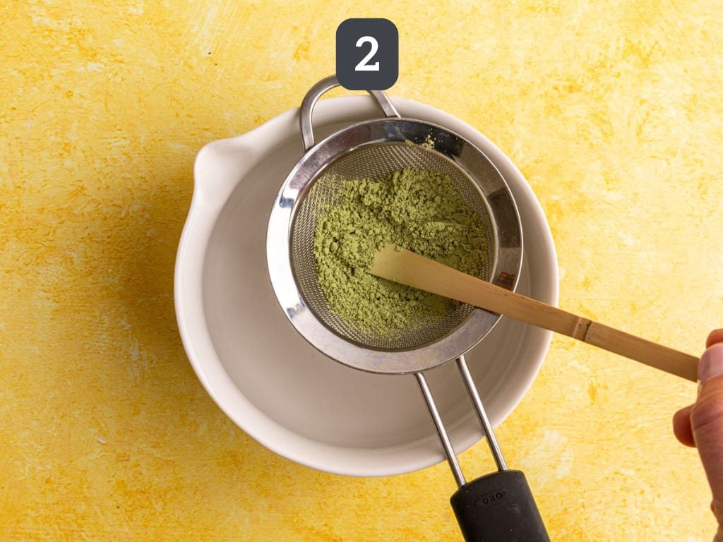 Banana cream matcha latte step 2 - sift the matcha.
