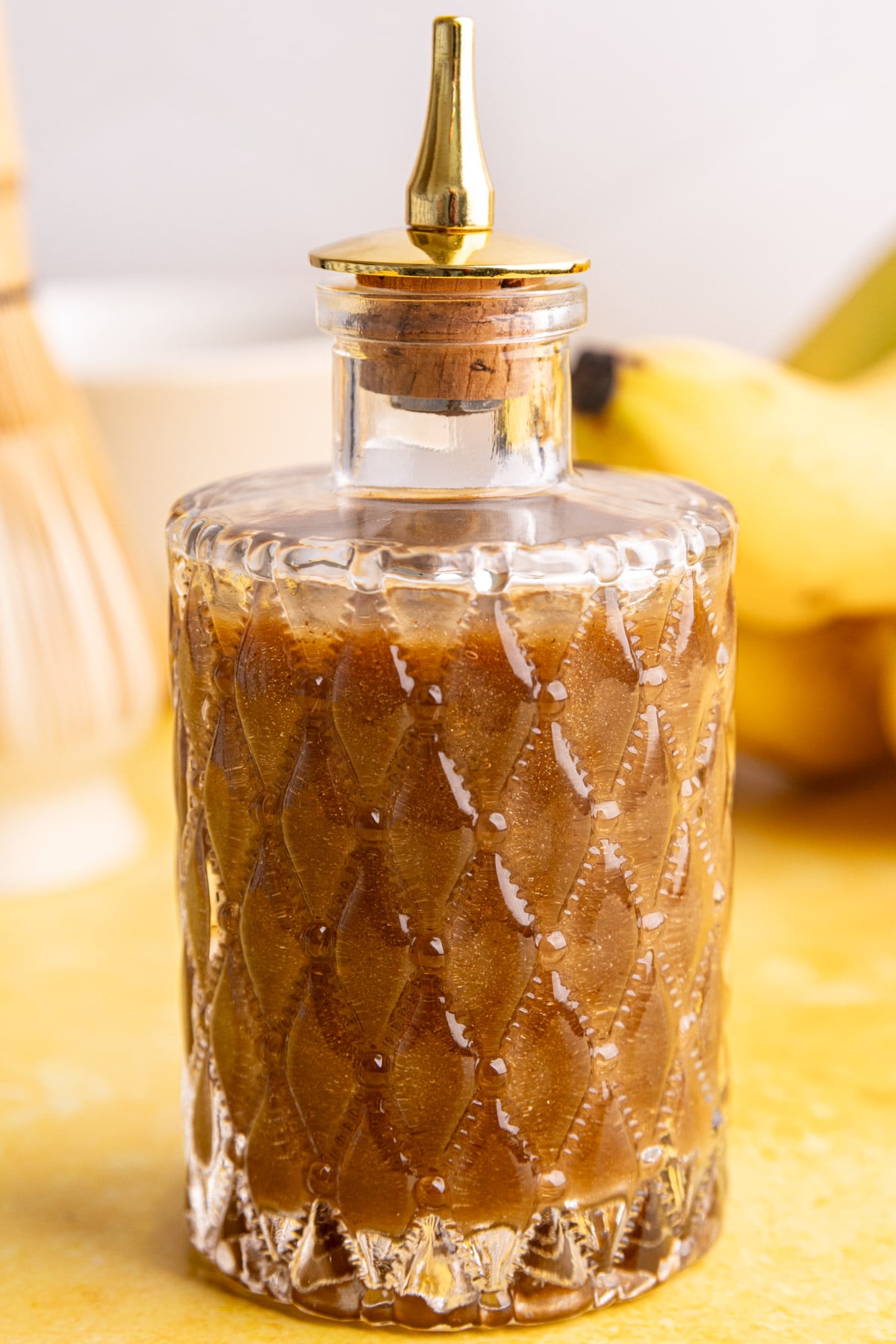 A jar of banana simple syrup.