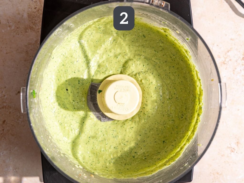 Basil Hummus Step 2 - blend, adding the aquafaba to thin.