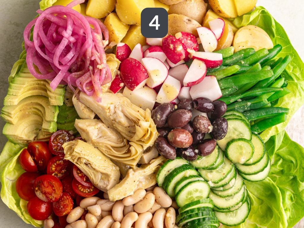 Vegan Nicoise salad step 4 - assemble the salad.