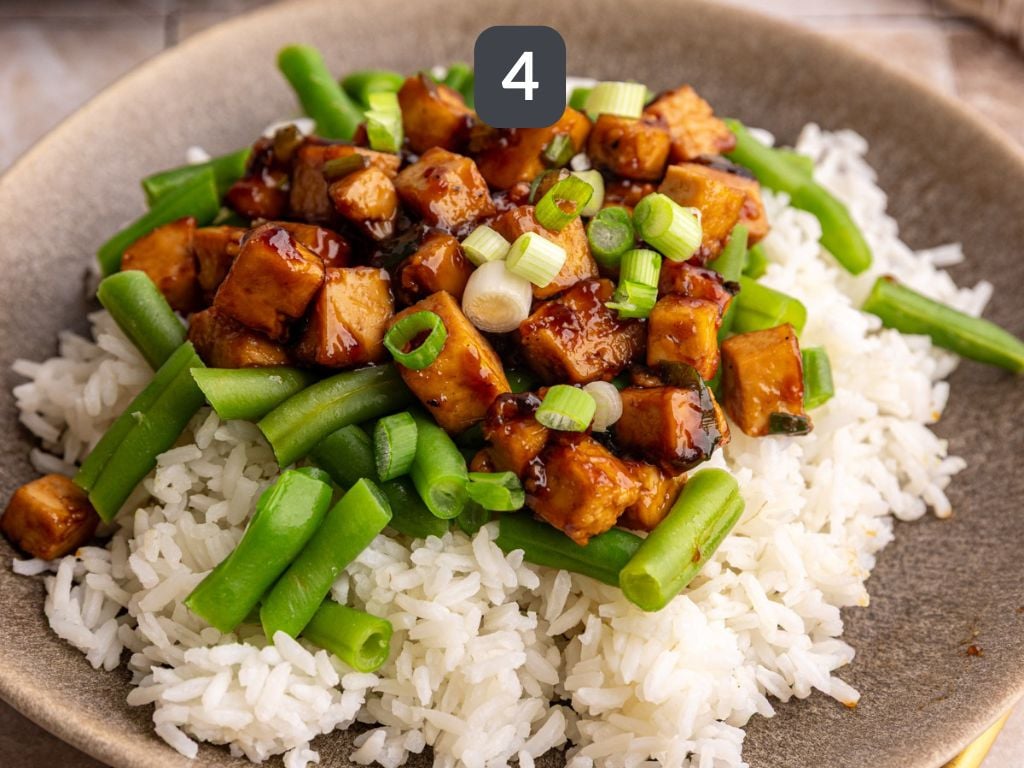 Easy Mongolian Tofu Step 4 - serve over rice with green beans and more scallions.