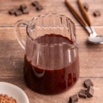 A small pitcher of Maple Chocolate Syrup.