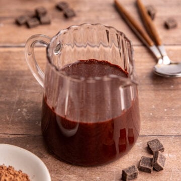 A small pitcher of Maple Chocolate Syrup.