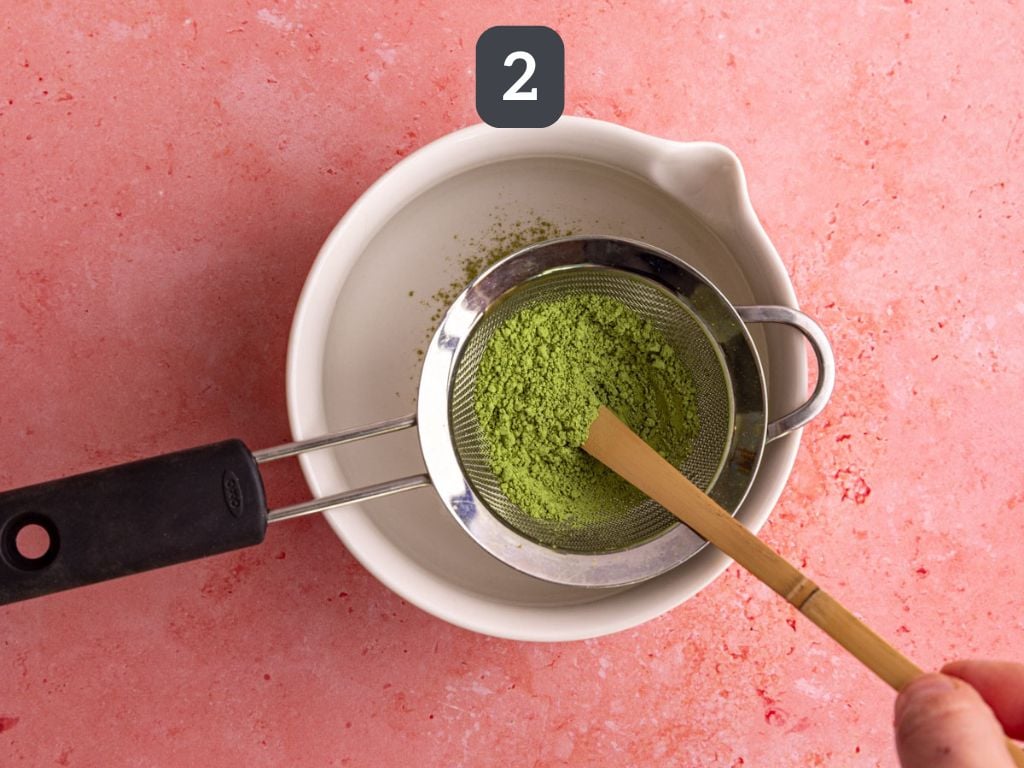 Raspberry matcha latte step 2 - sift the matcha.