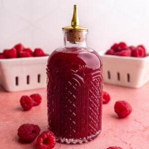 A bottle of raspberry simple syrup.