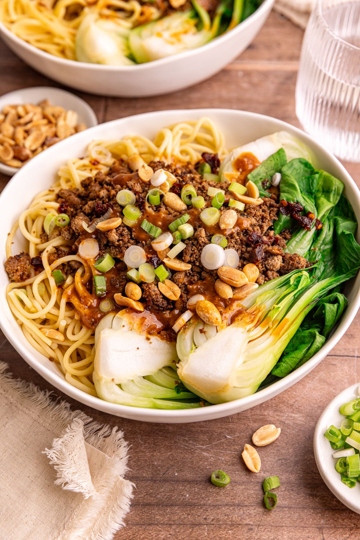 A bowl of Vegan Dan Dan noodles, ready to eat.