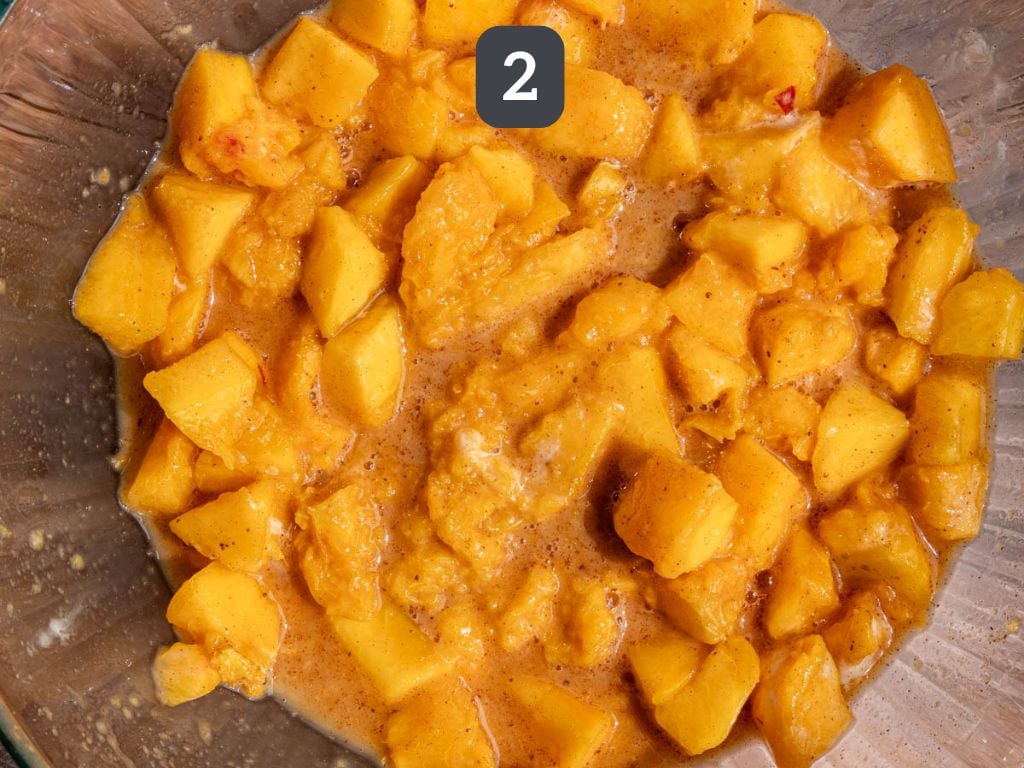 Vegan cornmeal peach cobbler step 2 - mix the filling ingredients.