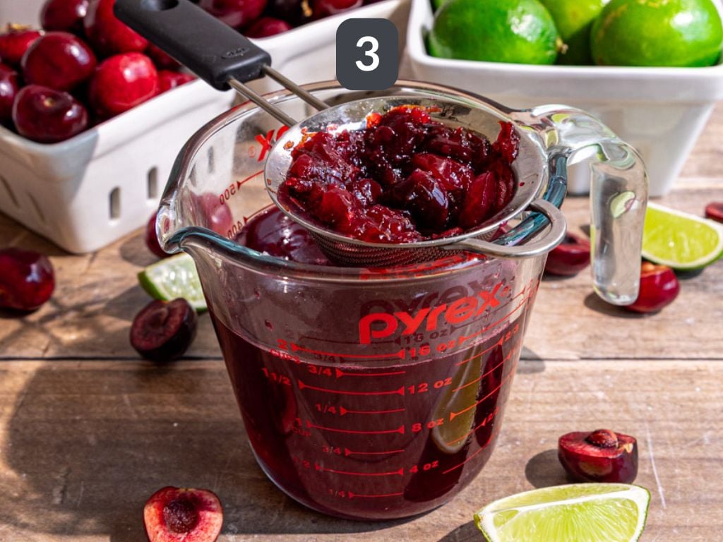 Cherry Limeade step 3 - strain through a fine mesh strainer.