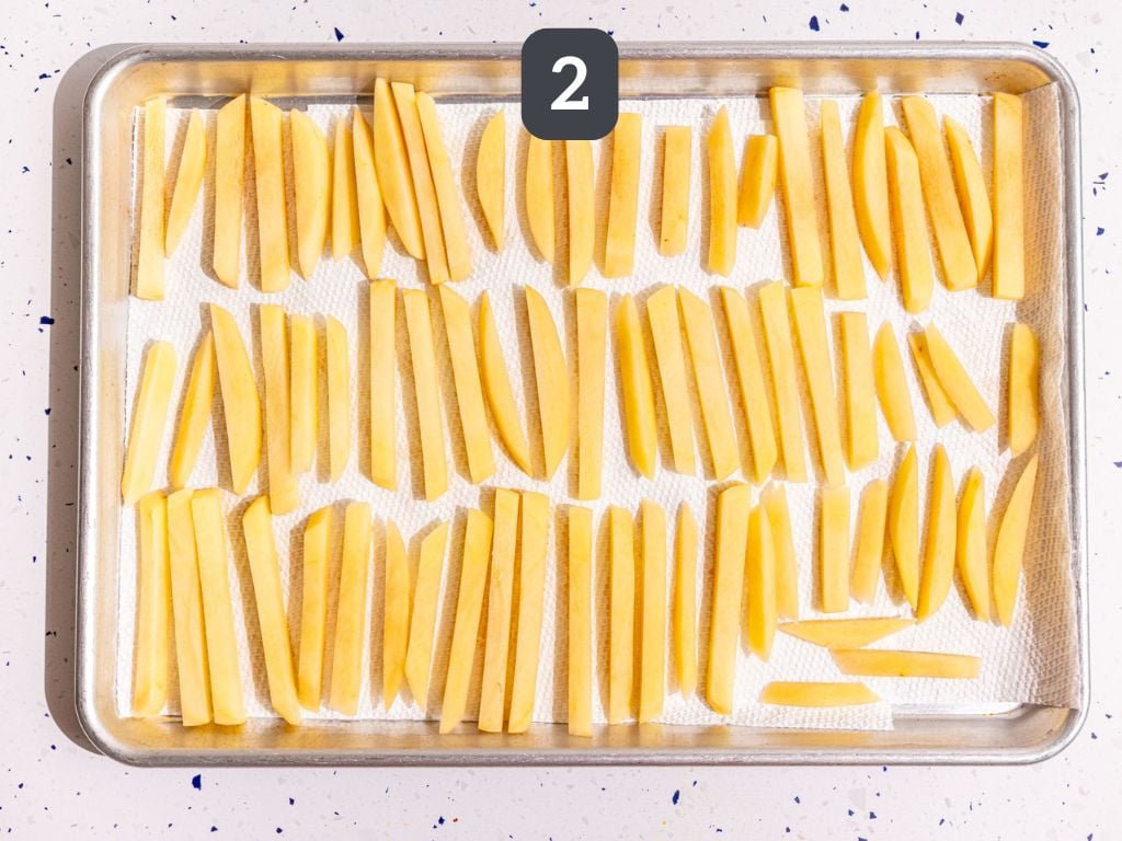 Loaded greek feta fries step 2 - cut the fries and pat dry.