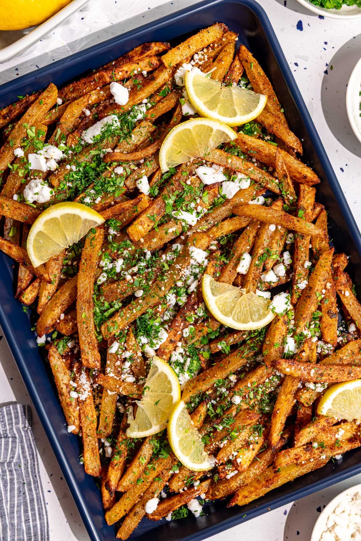 A tray of loaded greek feta fries.