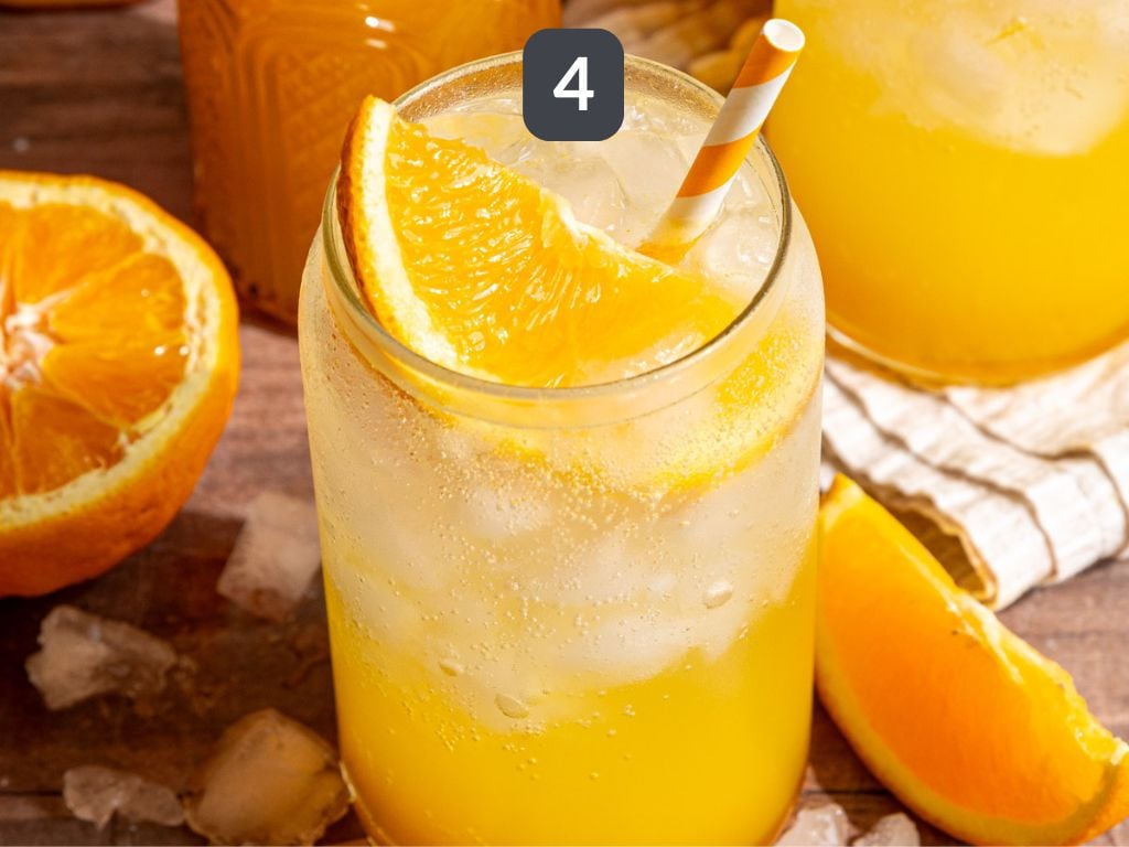 Orange Cream Soda Step 4 - serve the syrup over ice, topped with sparkling water.