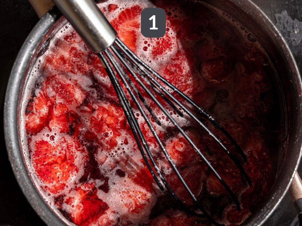 Strawberry Cream Soda Step 1 - heat the sugar, strawberries, and water.