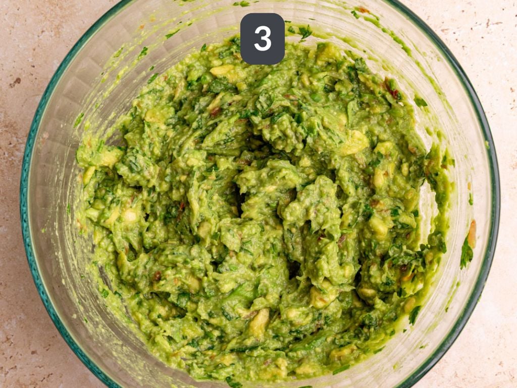 Guacamole step 3 - mix the remaining ingredients