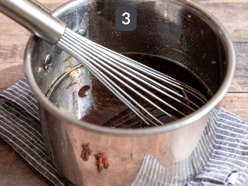 Homemade Cola Step 3 - stir in the vanilla and vinegar
