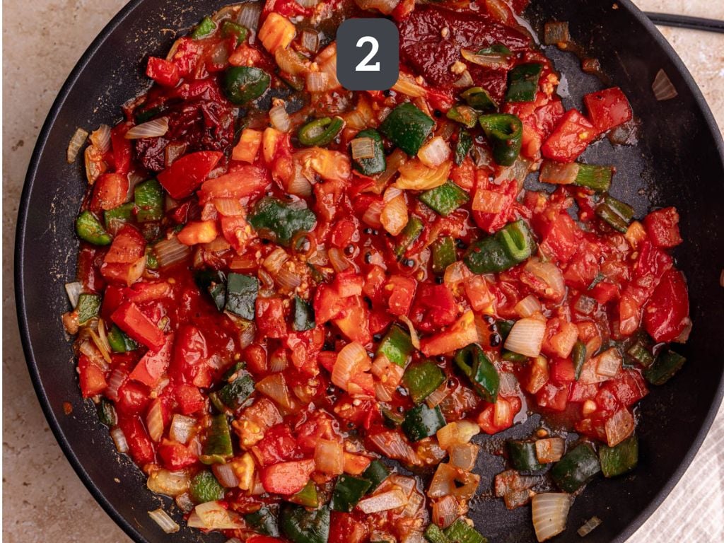 Homemade Sofritas Step 2 - add the tomato and spices.