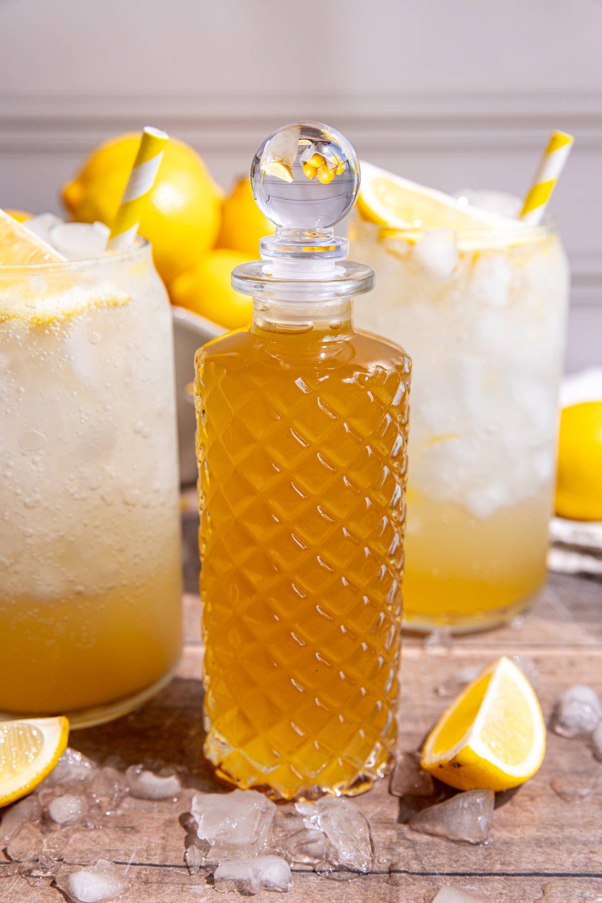 A jar of lemon vanilla syrup.