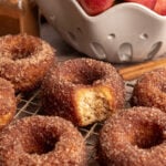A tray of vegan apple cider cake donuts.