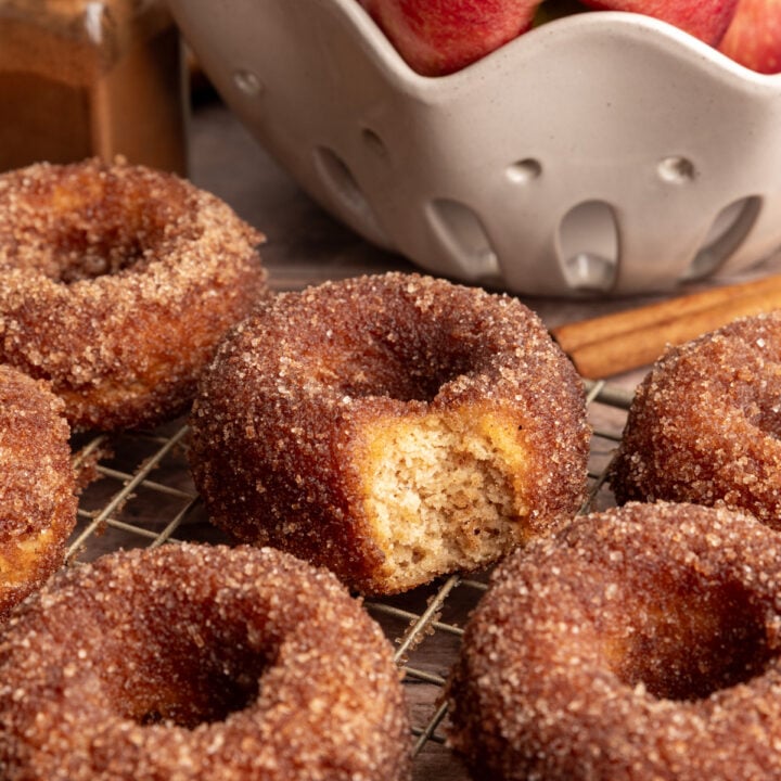 A tray of vegan apple cider cake donuts.