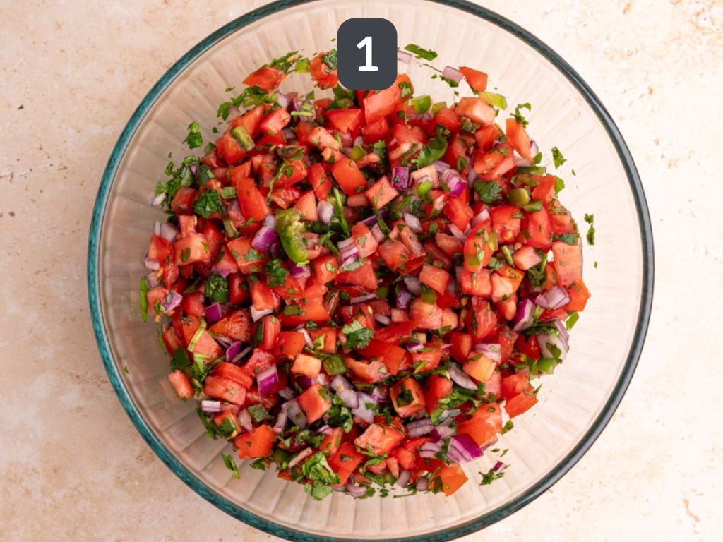 Homemade tomato salsa step 1 - mix all the ingredients.