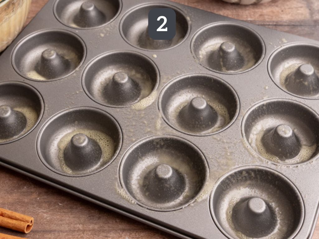 Vegan apple cider cake donuts step 2 - prepare the donut pan.