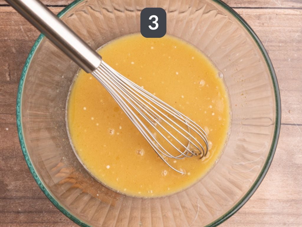 Vegan apple cider cake donuts step 3 - whisk the cider, butter, and yogurt.
