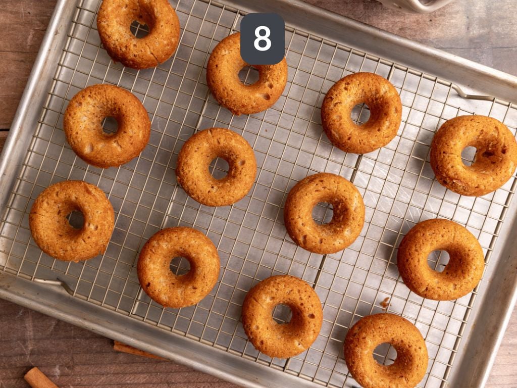 Vegan apple cider cake donuts step 8 - remove the donuts from the pans.