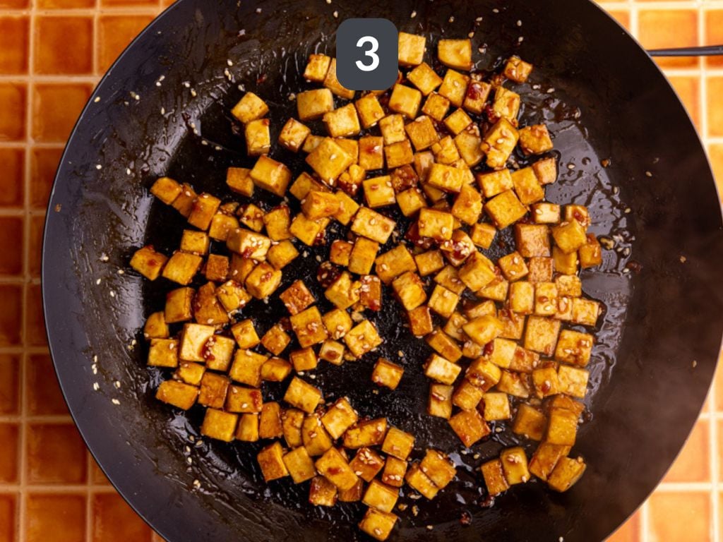 Bibibop style tofu step 3 - add the teriyaki sauce and cook.