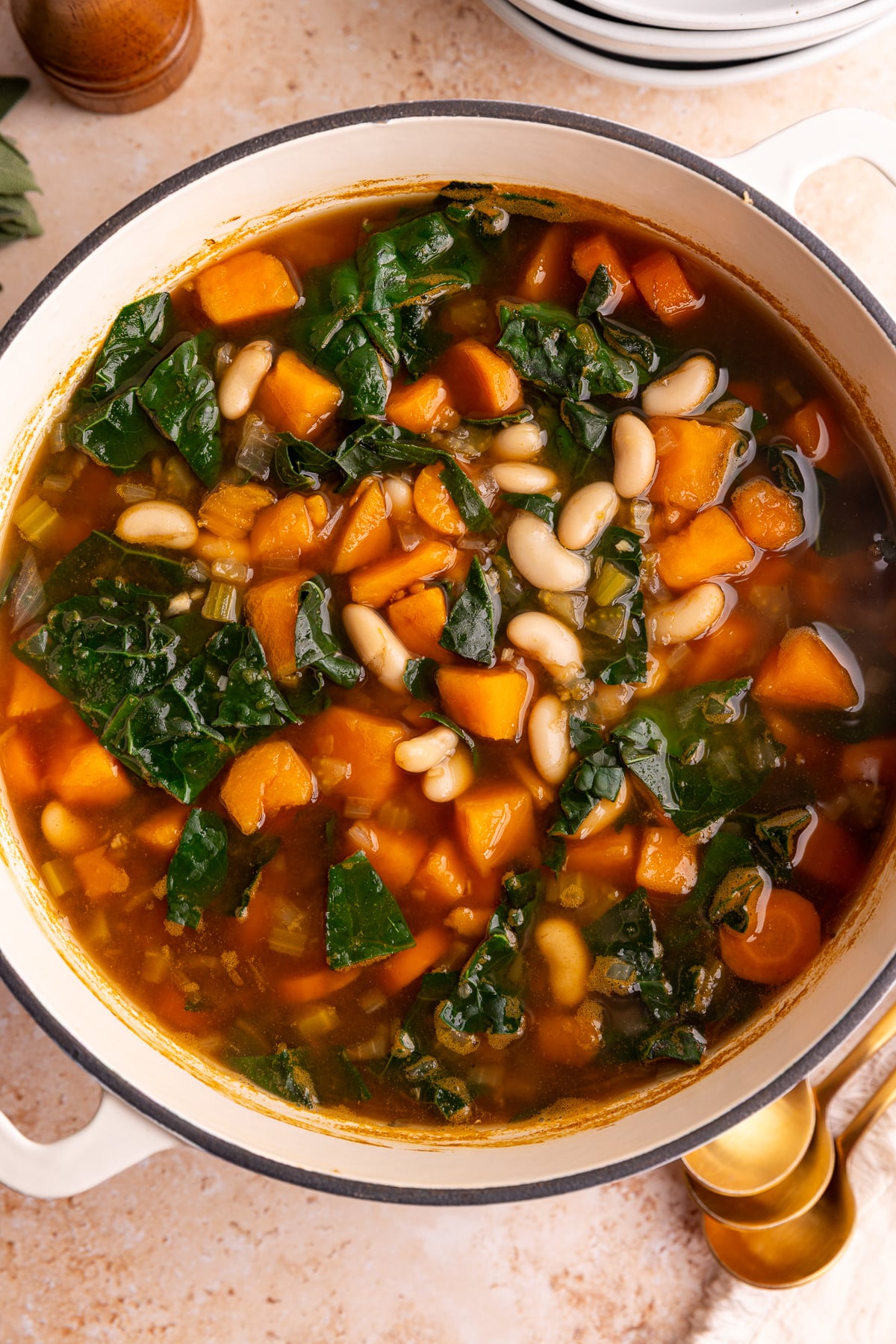 A pot of freshly cooked vegan harvest vegetable soup.