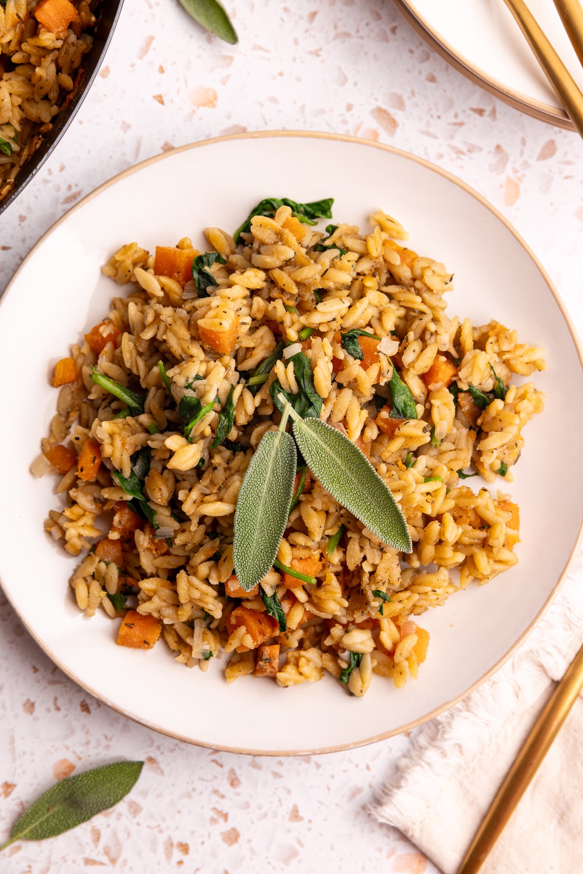 A plate of vegan baked sweet potato orzo.