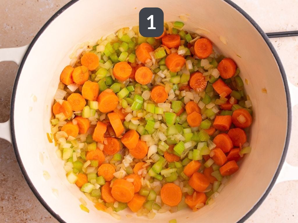 Vegan Harvest Vegetable Soup Step 1 - sauté the carrot, onion, and celery.