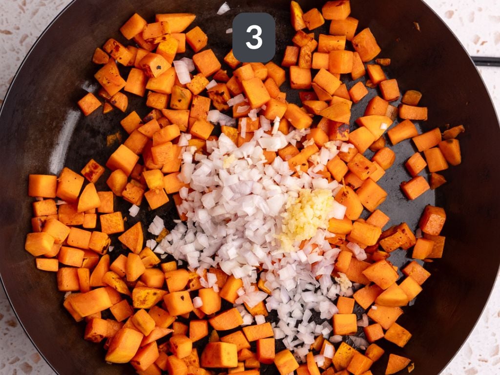 Vegan sweet potato baked orzo step 3 - add the shallot and garlic.